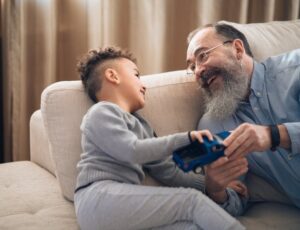 Grandpa and grandson on couch