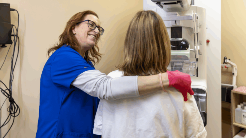 Female technologist comforting a patient before a 3D mammogram exam at Diagnostic Imaging Northwest.